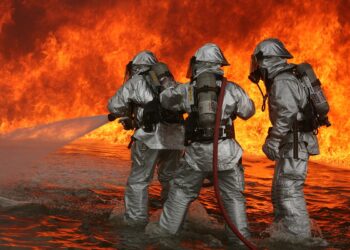 Aircraft, Rescue Firfighters aboard Marine Corps Air Station Miramar fight blazing fires during a controlled burn at the burn pit here. ARFF performed controlled burns June 13-14, they perform these burns about four times a year.