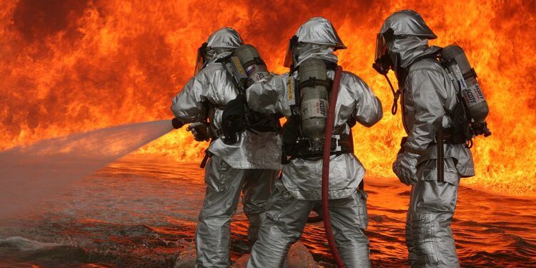 Aircraft, Rescue Firfighters aboard Marine Corps Air Station Miramar fight blazing fires during a controlled burn at the burn pit here. ARFF performed controlled burns June 13-14, they perform these burns about four times a year.